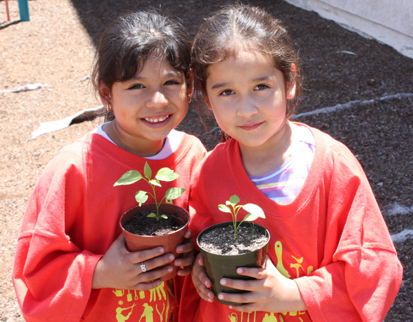 NeighborWorks Week 2009 girls with plants